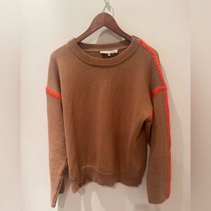 English Factory tan cotton sweater w. 
orange accents. 
Size L.